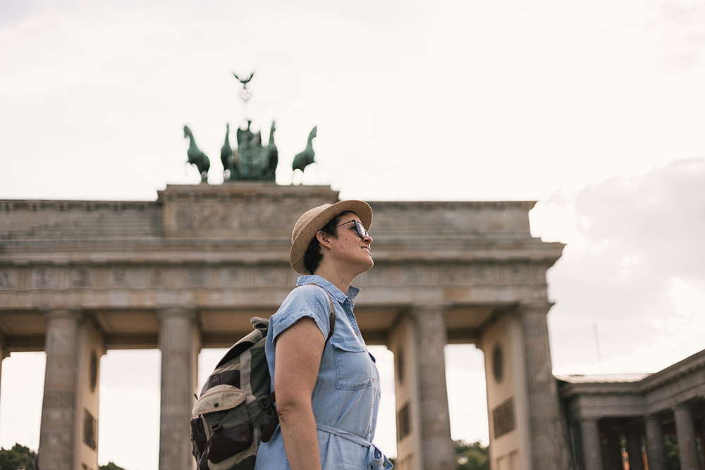 woman-with-backpack-in-berlin-2023-11-27-05-00-32-utc